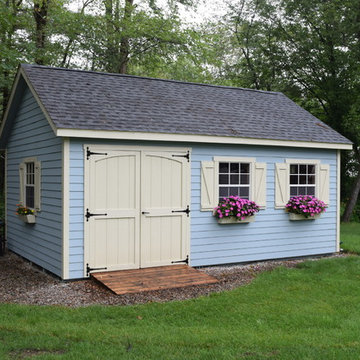 Storage Building with Vinyl Siding and Shingled Roof