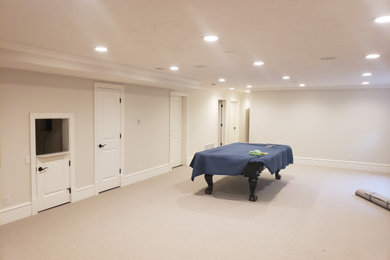 Example of a carpeted basement game room design in Salt Lake City
