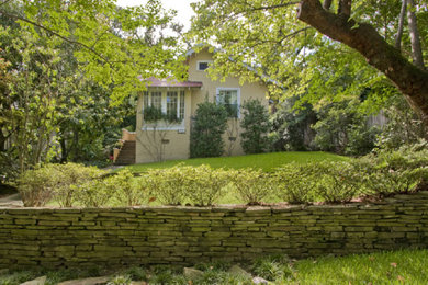 Example of an arts and crafts exterior home design in Little Rock