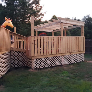 Custom built deck. 50ft walkway ramp, 5ft wrap around deck, step down 14x14 deck