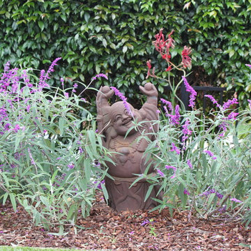 Garden Art Tucked Into the Plantings