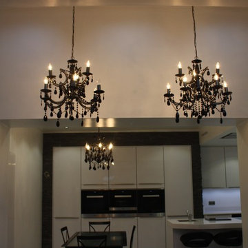 Ultra white Kitchen with feature wall