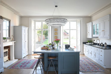 Design ideas for a large traditional kitchen in Hampshire with flat-panel cabinets.