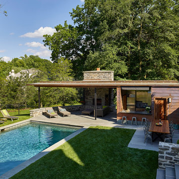 Modern Pool House for Sloped Site