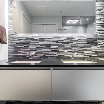 Spacious Floating Vanity with Kohler Composed(R) Sink Faucet and Backsplash Wall