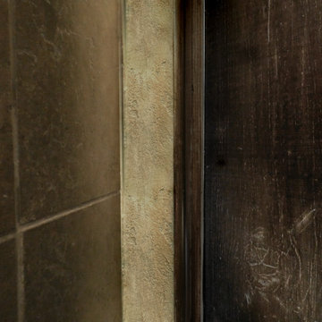 Decorative lime plaster & rough aged cedar linen cabinet
