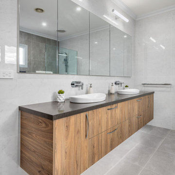 Spectacular Blend of Warmth in this Modern Main Bathroom Renovation