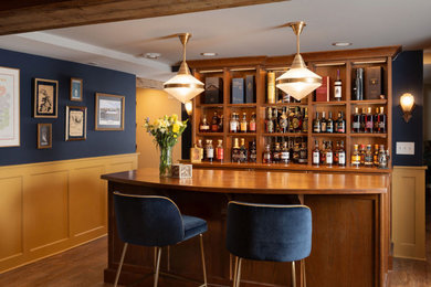 Example of a home bar design in Minneapolis