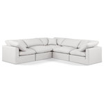 Meridian Furniture - Indulge Upholstered Modular L-Shaped Sectional, Cream, 5-Piece: 2 Armless Chair, 3 Corner Chair, Fiber Stuffed Vegan Leather - Experience ultimate comfort and style with our cream vegan leather Indulge Sectional. The luxurious vegan leather will elevate the aesthetic of any room. This sofa provides ample space for you to relax while its modular build offers the option of unlimited configurations. Whether you're looking to add a stylish element to your living room or a comfortable seating option to your bedroom, this sofa is the perfect choice.