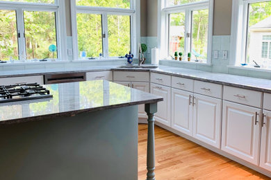 Example of a beach style kitchen design in Boston