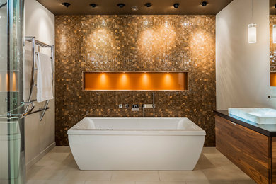 Mid-sized trendy multicolored tile and ceramic tile porcelain tile and beige floor bathroom photo in Chicago with furniture-like cabinets, brown cabinets, a wall-mount toilet, white walls, a vessel sink and wood countertops