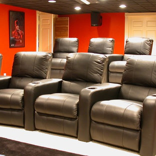 Design ideas for a traditional home cinema in Portland Maine with carpet and a projector screen.