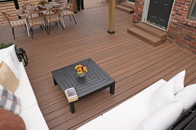 Inspiration for a cottage backyard ground level deck remodel in Other