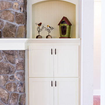 Fireplace flanked with Bookshelves