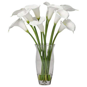 White calla lilies in glass vase