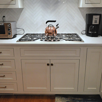 Chappaqua NY - Custom White & Navy Cabinets w/ Honey Bronze
