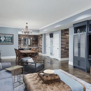 Photo of a traditional fully buried basement in Chicago with blue walls and brown floors.