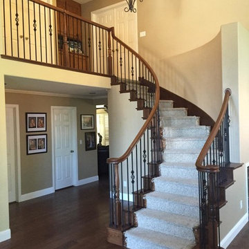 San Ramon Curved Stair Update with Tread Ends and Iron Balusters