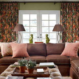 Inspiration for a mid-sized transitional enclosed carpeted home theater remodel in Birmingham with green walls and a media wall