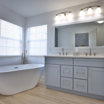 Spacious Bathroom with Dual Vanity and Freestanding Tub