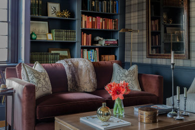 Inspiration for a mid-sized timeless light wood floor home office library remodel in Boston with blue walls