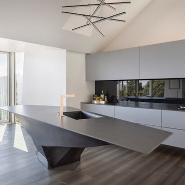 Sculptural Steel Island Anchoring the Kitchen