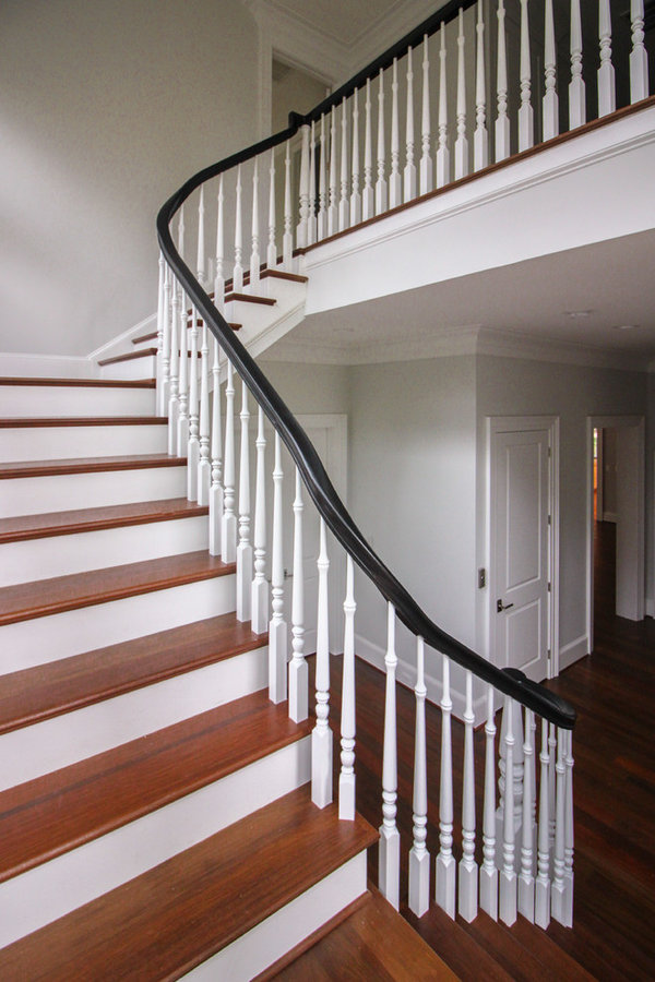 Powerful Impression by Floating Staircase in Suburban Foyer