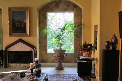 Example of a large tuscan home design design in Tampa