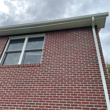 Deck stain and gutters powerwash