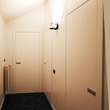 porte interne effetto filomuro e abbinamento porta in vetro