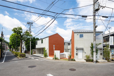 東京23区にある低価格の北欧スタイルのおしゃれな家の外観 (レンガサイディング、アパート・マンション) の写真