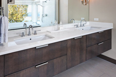 Bathroom - large contemporary master white tile and porcelain tile porcelain tile and beige floor bathroom idea in Chicago with flat-panel cabinets, dark wood cabinets, beige walls, an undermount sink, quartz countertops and white countertops