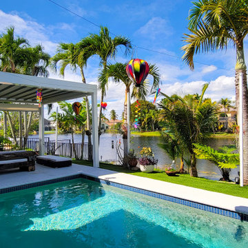 Retractable Pergola with Motorized Screens on Poolside Patio