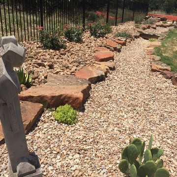 Xeriscape w/ dry creek bed for drainage