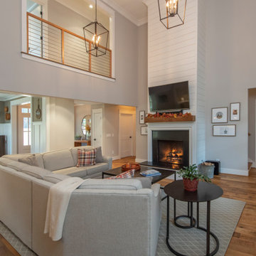 Two-story Living Room with Balcony overlook