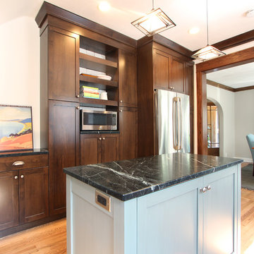 Countertop Microwave below floating shelves with tile backsplash