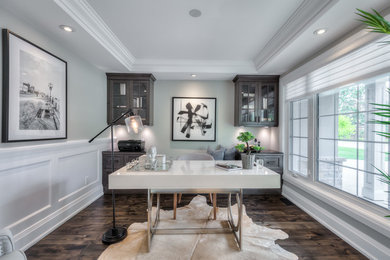 Inspiration for a large contemporary freestanding desk study room remodel in Toronto with green walls