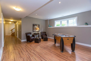 Basement - traditional basement idea in Toronto