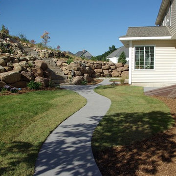 Boulder wall and pond