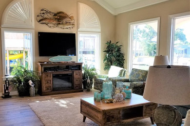 Beach style home design photo in Austin