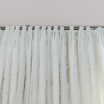 French Pleated Sheer Drapery Panel on Brushed Nickle Track Hardware