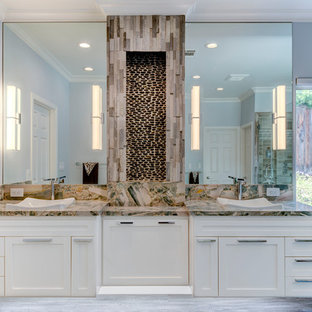 Example of a large transitional master gray tile and porcelain tile plywood floor and gray floor alcove shower design in San Francisco with shaker cabinets, white cabinets, a two-piece toilet, gray walls, a drop-in sink, quartzite countertops, a hinged shower door and multicolored countertops