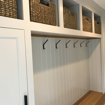 Multifunctional Cabinet System in a Family Room and Mudroom