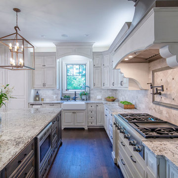 Beautiful lights, natural lighting, large island with custom stain.