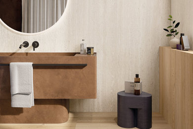 Powder room - modern beige tile and porcelain tile porcelain tile and brown floor powder room idea in New York with flat-panel cabinets, brown cabinets, beige walls, solid surface countertops, brown countertops and a freestanding vanity