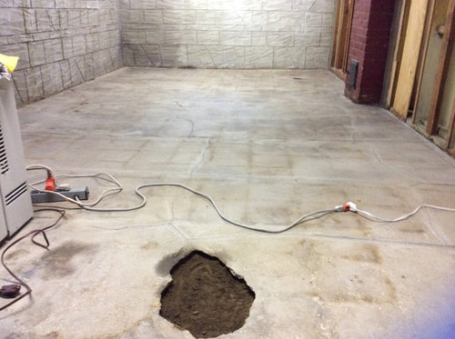 Basement Concrete Floor Repairs, Warm Spot On Basement Floor