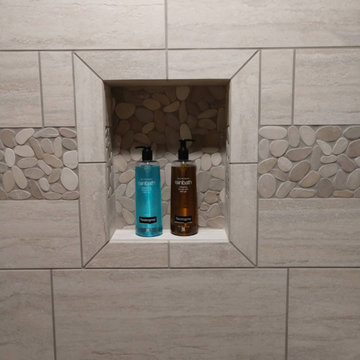 Custom Tile Shower with Pony Wall, Corner Seat, Niche, & Sliced Pebble Mosaics