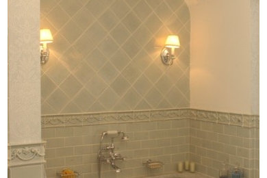 This is an example of a mid-sized traditional master bathroom in New York with an alcove tub, blue tile, subway tile and white walls.