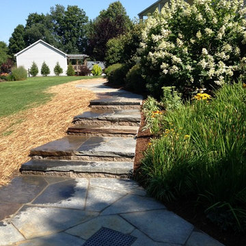 Stone walkway and stone steps.