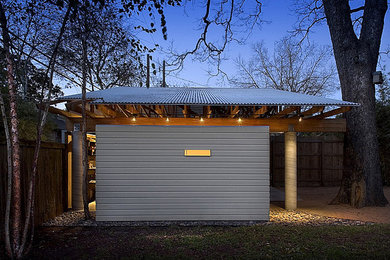 Arts and crafts detached two-car carport photo in Houston